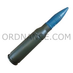 25mm 25x137 Bushmaster TP-T M793 round with unfired case, white lettering on projectile